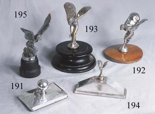 Rolls-Royce Spirit of Ecstasy - An original motor car mascot for Silver Ghost/Phantom model types, stamped signature Charles Sykes and Rolls Royce Ltd. 1911 to base, nickel plating polished and worn, mounted on polished ebonised base.  Height 5½ ins (14 cm).