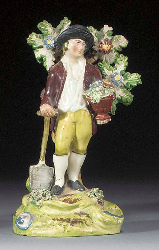 A Walton figure of a gardener