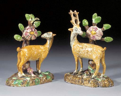 A pair of pearlware models of a stag and doe