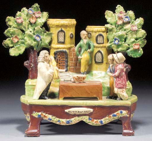 A pearlware 'Baptism of Mary' table base group