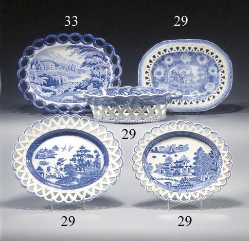 A pottery blue and white two-handled pierced oval basket