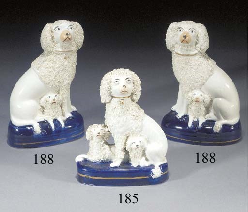A group of a poodle and pups