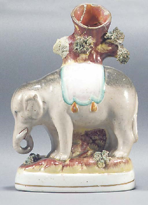 An elephant spill vase