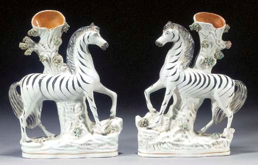 Two zebra spill vases