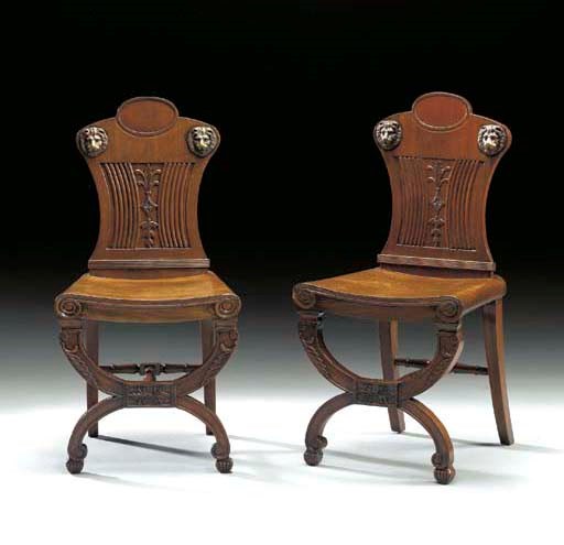 A PAIR OF REGENCY BRASS-MOUNTED MAHOGANY HALL CHAIRS