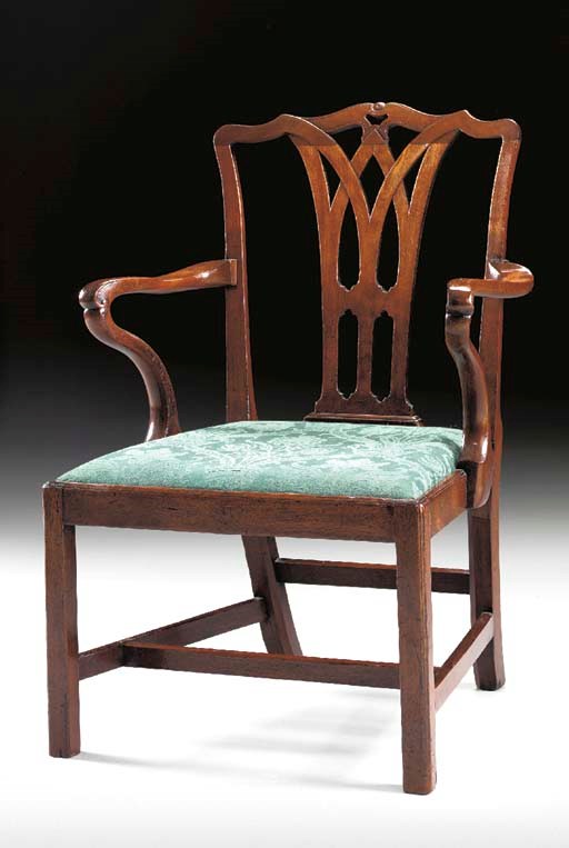 A GEORGE III MAHOGANY OPEN ARMCHAIR