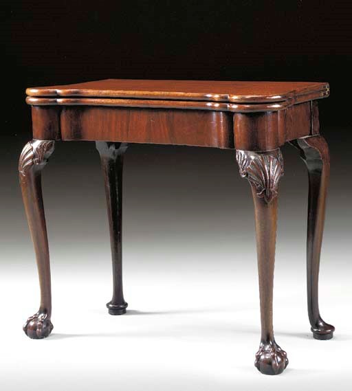 A GEORGE II MAHOGANY CONCERTINA-ACTION GAMES TABLE