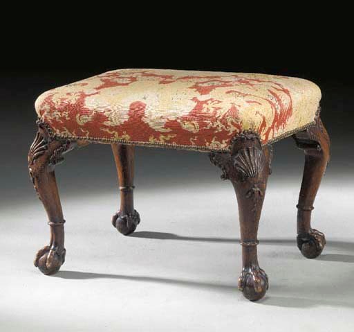 A GEORGE II WALNUT STOOL