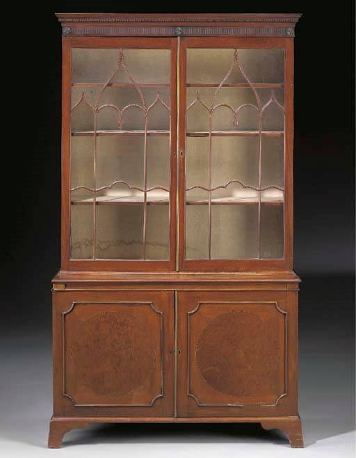 A GEORGE III MAHOGANY AND PLUM-PUDDING MAHOGANY BOOKCASE-CABINET