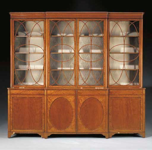 A LATE VICTORIAN INLAID SATINWOOD AND ROSEWOOD BREAKFRONT-BOOKCASE