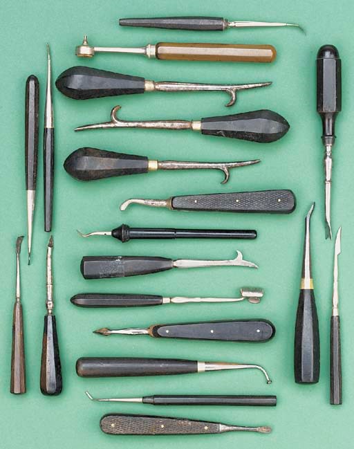 A miscellaneous collection of dental elevators,