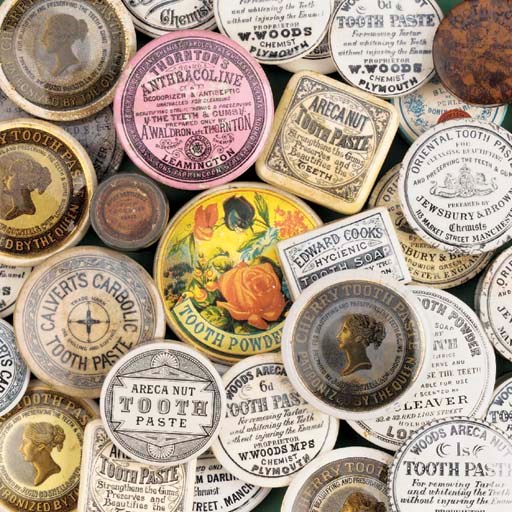 A collection of 19th-Century tooth-paste pot-lids,