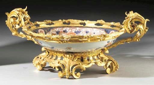 A Louis XV style ormolu-mounted Arita-ware charger