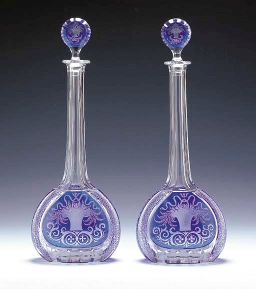 A PAIR OF BOHEMIAN BLUE-FLASH CUT-GLASS DECANTERS AND STOPPERS