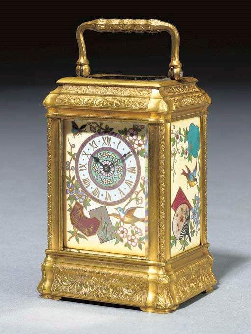 A French Aesthetic movement ormolu and champleve enamelled carriage clock