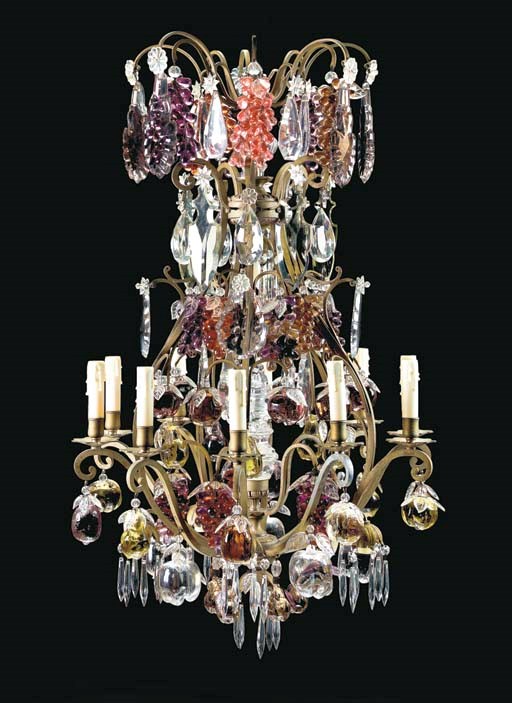 A Rococo style silver metal, clear and coloured cut glass ten-light chandelier