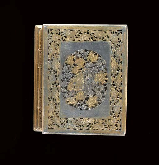 A Moghul silver gilt box and hinged cover
18/19th Century