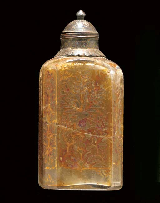 A small Moghul glass bottle and cover
18/19th Century