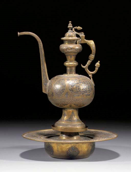 A Cairoware brass ewer and stand
19th Century