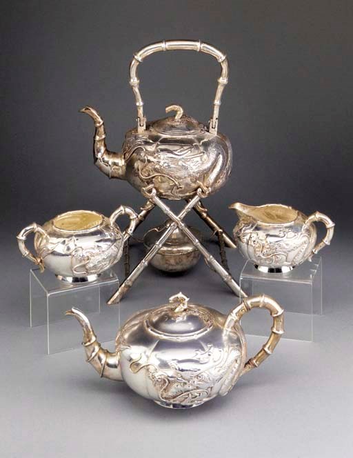 A Chinese four piece silver tea service
Early 20th Century