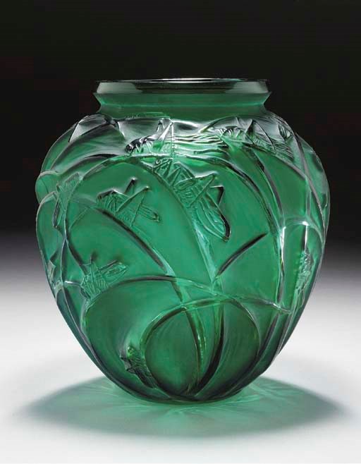 'SAUTERELLES', A GREEN GLASS VASE