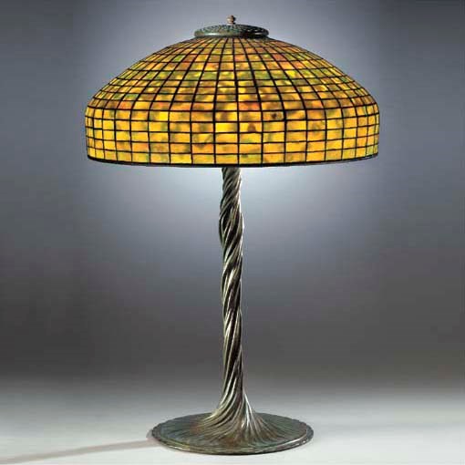 A 'GEOMETRIC' LEADED GLASS AND BRONZE TABLE LAMP