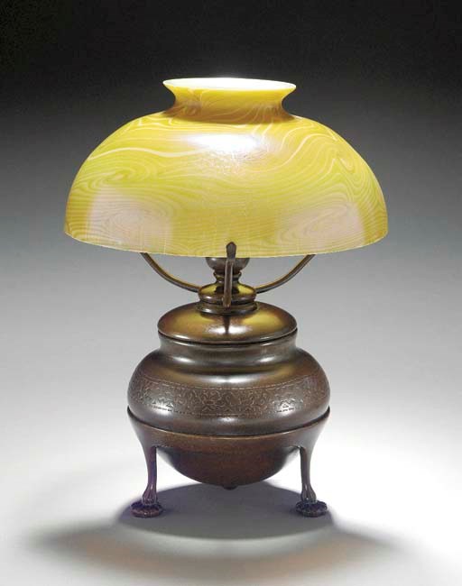 A FAVRILE GLASS AND BRONZE DESK LAMP