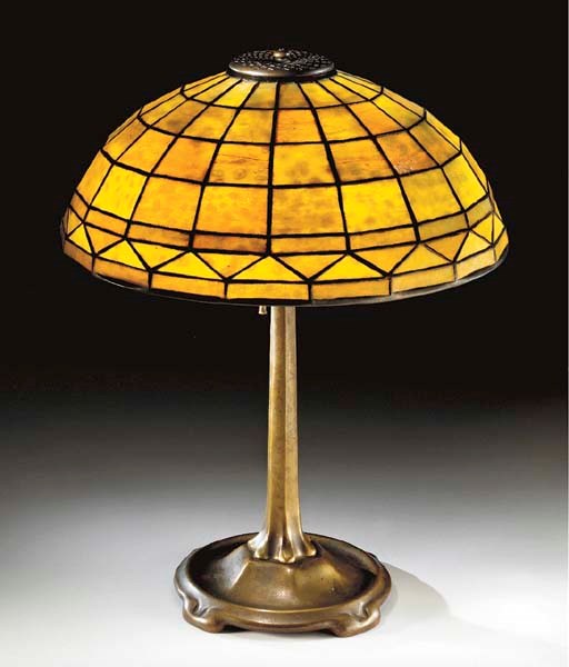 A 'GEOMETRIC' LEADED GLASS AND BRONZE TABLE LAMP