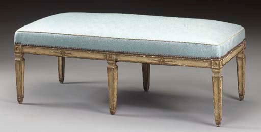 AN ITALIAN NEOCLASSIC STYLE PARCEL-GILT AND WHITE-PAINTED BENCH,