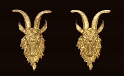 A PAIR OF ORMOLU RAM'S MASK WALL-APPLIQUES,