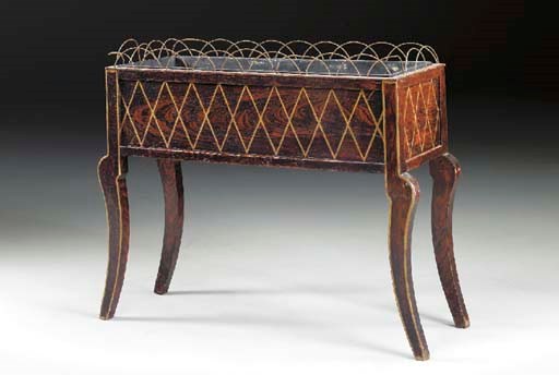 A CONTINENTAL SIMULATED CALAMANDER AND PARCEL-GILT JARDINIERE,