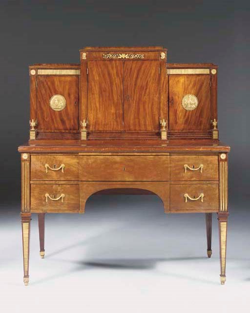 A NORTH EUROPEAN ORMOLU-MOUNTED AND BRASS-INLAID MAHOGANY SECRETAIRE CABINET