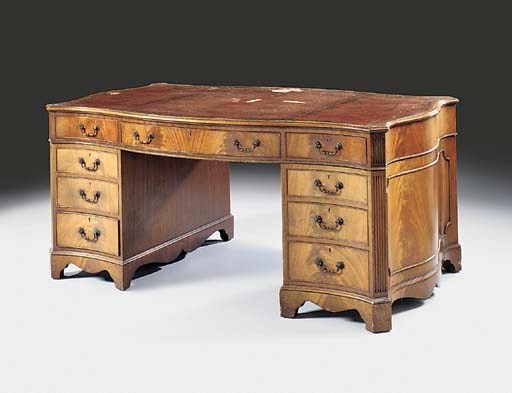 A mahogany serpentine partners desk, early 20th century
