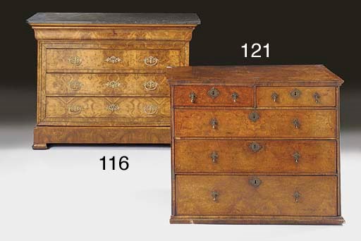 A Charles X walnut and burr walnut commode