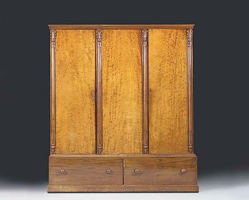 An early Victorian mahogany gentleman's wardrobe
