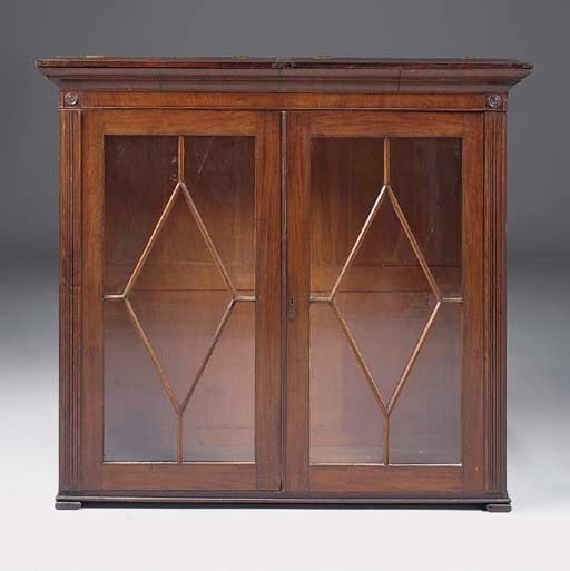 THE UPPER HALF OF A MAHOGANY BOOKCASE, EARLY 19TH CENTURY AND LATER