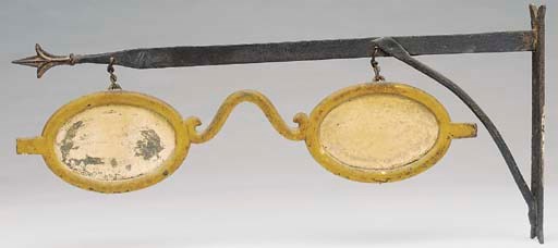 An English painted wrought iron Optician's sign, circa 1870
