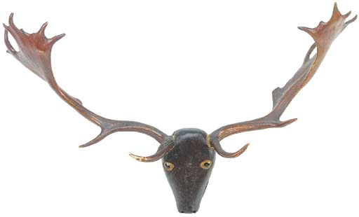 An Irish or Scottish polychrome wood and antler horn mounted game trophy, circa 1800