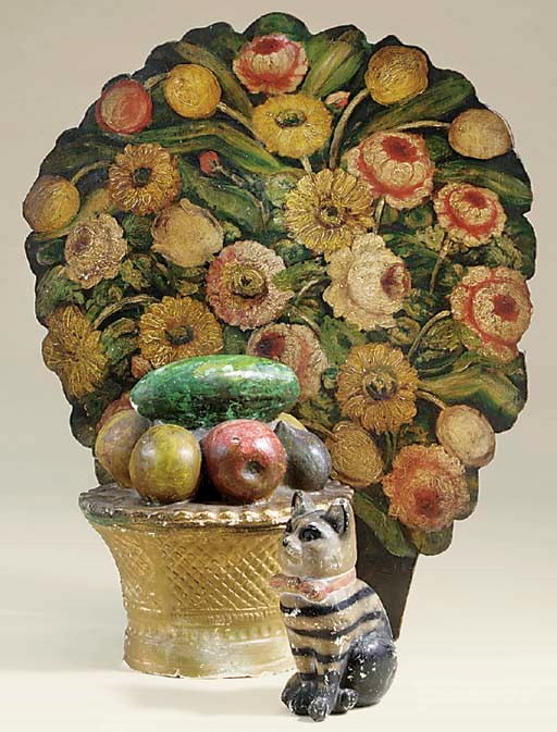 A Victorian polychrome chalkware plaster money box, second half 19th century