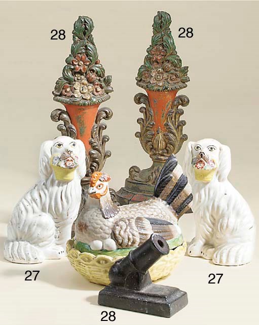 A pair of Victorian polychrome cast iron doorstops