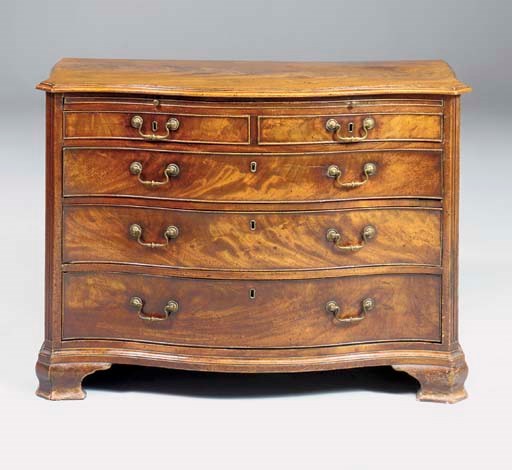 A GEORGE III MAHOGANY SERPENTINE DRESSING-COMMODE