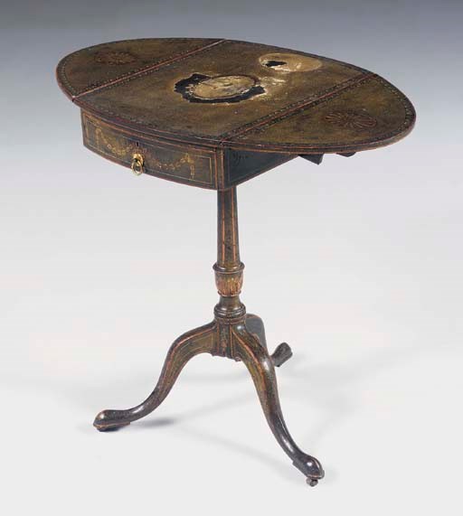 A GEORGE III PAPIER-MACHE POLYCHROME-PAINTED AND EBONISED OVAL TRIPOD PEMBROKE TABLE