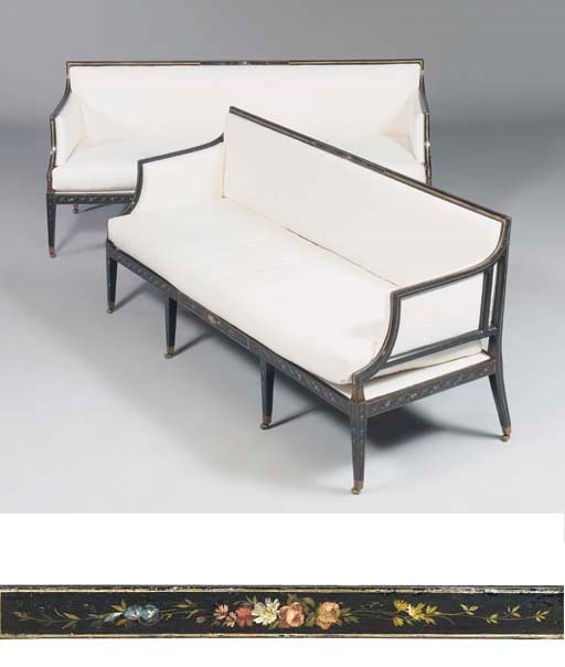 A PAIR OF GEORGE III EBONISED AND COLOUR-PAINTED SOFAS