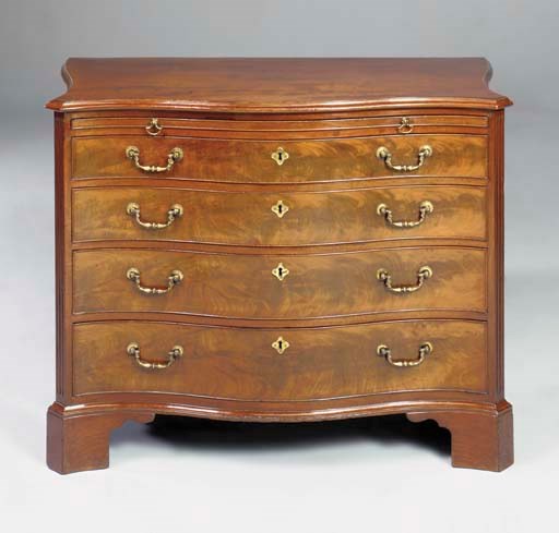A GEORGE III MAHOGANY SERPENTINE CHEST