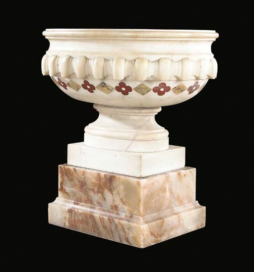 A GEORGE II WHITE MARBLE CISTERN ON AN ALABASTER PLINTH