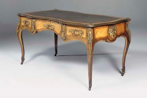 A MID-VICTORIAN ORMOLU AND BRASS-MOUNTED KINGWOOD AND BOIS SATINÉ BUREAU PLAT