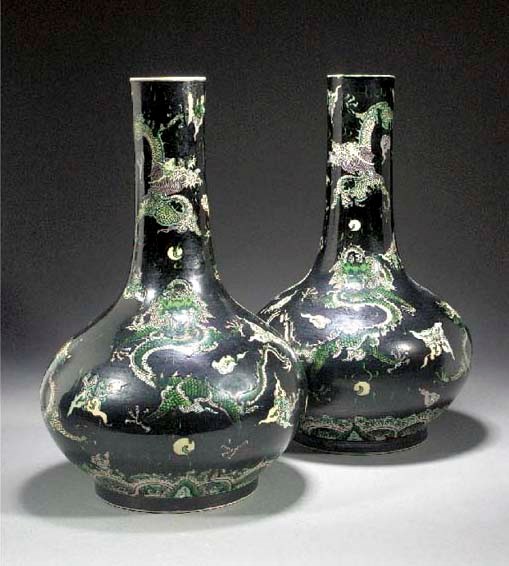 A pair of famille noire bottle vases
19th century