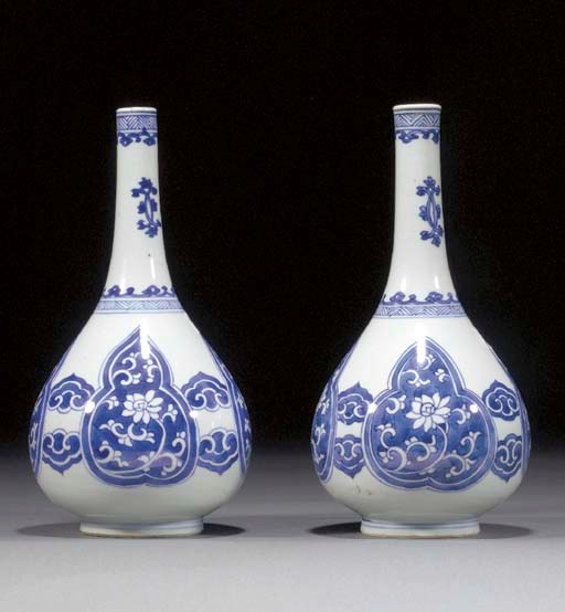 A pair of Chinese blue and white bottle vases
Kangxi