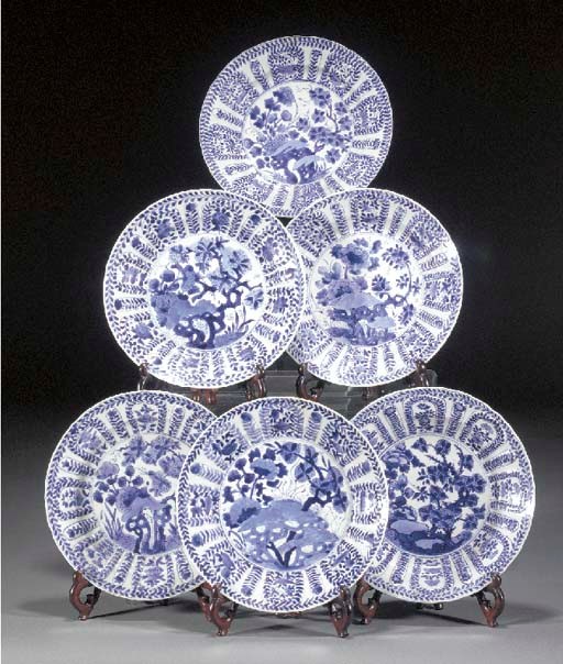 A set of six blue and white plates
Kangxi
