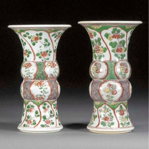 A pair of famille verte beaker vases
Kangxi